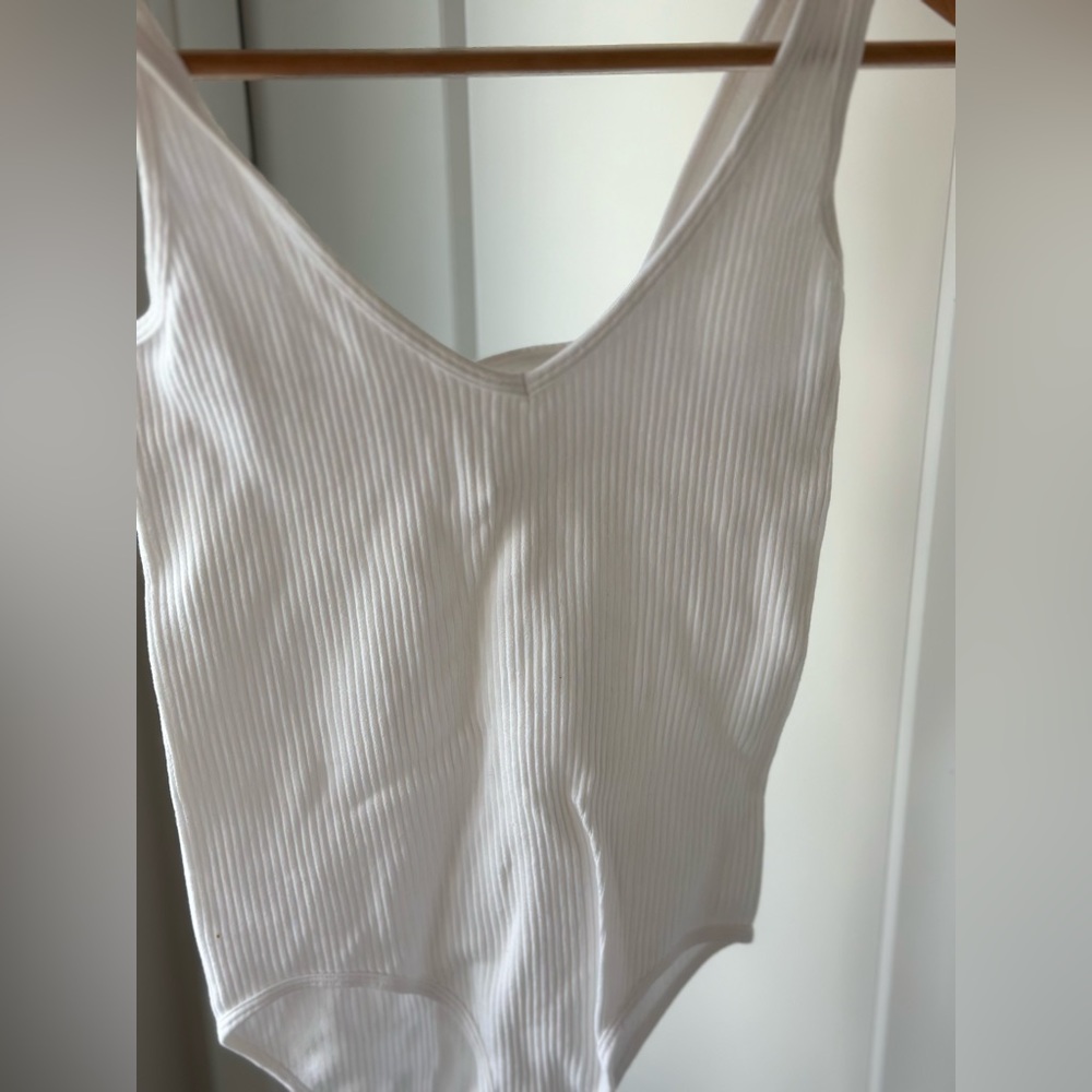 Bodysuite in white.